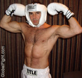 muscled boxer flexing hairyarms.jpeg