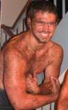 covered in dirty man flexing biceps dorm room.jpg