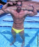 muscleman wet flexing in pool.jpeg