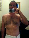 wet dripping man wearing towel shower sauna bath room.jpg