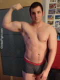 italian hot muscleman flexing biceps.jpg