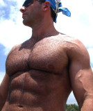 muscleman trimmed chest hairy pecs swimmer.jpg