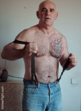 a hot irish older grandaddy removing suspenders.jpg