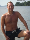 blond hairychest daddybear boating lake skiing swimming trunks.jpg