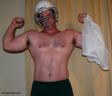 big arms football players removing jersey clothing hunky jocks.jpg