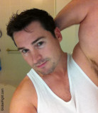 studly jock wearing tanktop seeking gay sexy buddies.jpg
