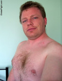 handsome hairy blond bear cub hairychests.jpg