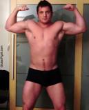 italian musclemen flexing biceps italy personals.jpg