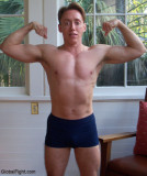 muscle boyz flexing hard ripped biceps abdominals.jpg