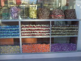 Candy shop in Adana. The turban-shapes are a solid mass of nuts and jelly-rollup-like filling.