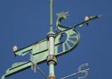 Peregrines: bodies facing west on south pointing upper spar of Viking boat