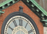 Peregrines: east side of clock face; pair on ledges at angle above 10 & 2 on clock face