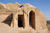Stairways leading up to the long-gone parapet and down to the buried ground floor