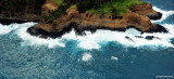 land and blue sea