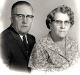 Another photo of this fine couple. I believe the disfigurment shown on George's ear came from his experience in the Great War.