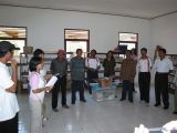 presenting a new computer to the school