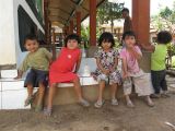 kids waiting outside the class room door (too young to start school yet)