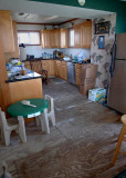 MOST OF THE RUINED FLOORING HAD ALREADY BEEN REMOVED