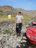 Guide Aldo, foreground, with our bathroom tent, called The Groover, behind him