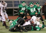 Sidney's Mike Burpoe stopped after a fullback run up the middle