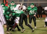 Vinnie Pettinato stops the runningback for a short gain on first down