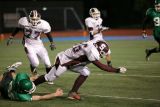 Colin Ballard tackles Sidney's Mike Burpoe
