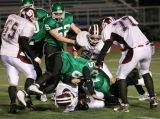 Lee Rogers tackling Sidney's Chase Mott with seconds left before halftime