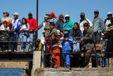 Crowds gathered an the pier of Puno harbor