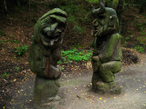 Pair of macabre carvings