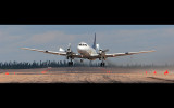 A Convair 580 lifting off in a strong X-wind off rwy 15 at CYNL.
