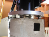 Here is a detail of the attaching plate. It is a composite of a 12 in. plate with the middle cut-out and welded to a 5-1/2 in. plate to match the electronics cylinder of the CI700 (the black device). The height to the top of the plate (bottom of the cylinder) is exactly 42 inches. This closely matches the original height of the field tripod - 43 inches - and works well for me, being 5' 7-1/2 inches. (Notice I got that extra 1/2 inch in there :O)