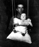 LeRoy Charles Merrill was the third of twelve children born to William John Whiston Merrill & his wife, Lillian Elizabeth T. Walker Merrill. I'm not actually sure what his name order was. I've seen it recorded on official documents as Charles LeRoy, & LeRoy Charles. He was known by simply, Roy. On 10 August 1915, LeRoy Charles Merrill married Dorothy Mae Bishop, in Rockwell, Calhoun County Iowa. Together this couple would have three children. In this picture Roy is swinging his daughter Dorothy. The original photograph shown was given to me by my grandmother, Hazel Alice Merrill. I am in possession of it still.