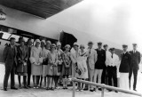 1929 - the Burdine Fashion Show group posing in front of a Pan American Airways System aircraft in Miami