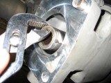 Remove drive shaft by gently pulling it out