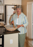 Ann Peralta stirring up the salad at John's dinner