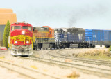 BNSF 122 leads the climb.