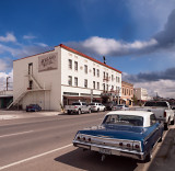 The Holland Hotel, Alpine, TX, with a vintage Chevy in the foreground