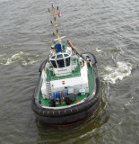Tug boat arrives