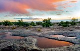 Puddles at Canyon De Chelly National Monument, AZ at sunset.