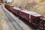 Custom solar panel details were added to the Walthers ballast hoppers.