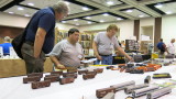 Modelers at the display tables