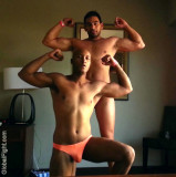 hunks flexing hotel room.jpg