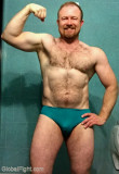 redhead flexing hairy muscles.jpg
