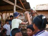 learning to cut wood in Lombok ( lumber yard )