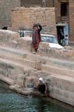 Girl fetching a pail of water, Hababa