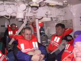 Mike's picture of Bob, Dave, Gail, Tom, Shonu & Linda enjoying our lifeboat drill -- where will the other 18 fit?