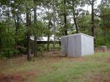 Noni's cabin?? Almost! (hidden on the left) Well House