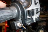 Install the switch on inside of the left handlebar grip