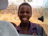 A young lady says hi