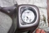 Front view. Make sure the word TOP on the top of the light is at the top of the cowl